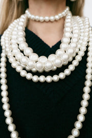 MULTI-STRAND NECKLACE WITH FAUX PEARLS