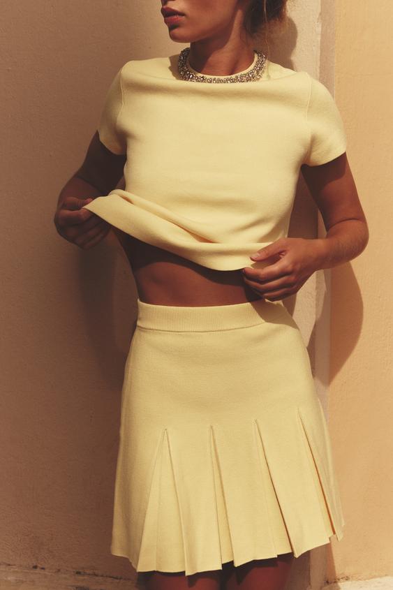 PLEATED KNIT MINI SKIRT