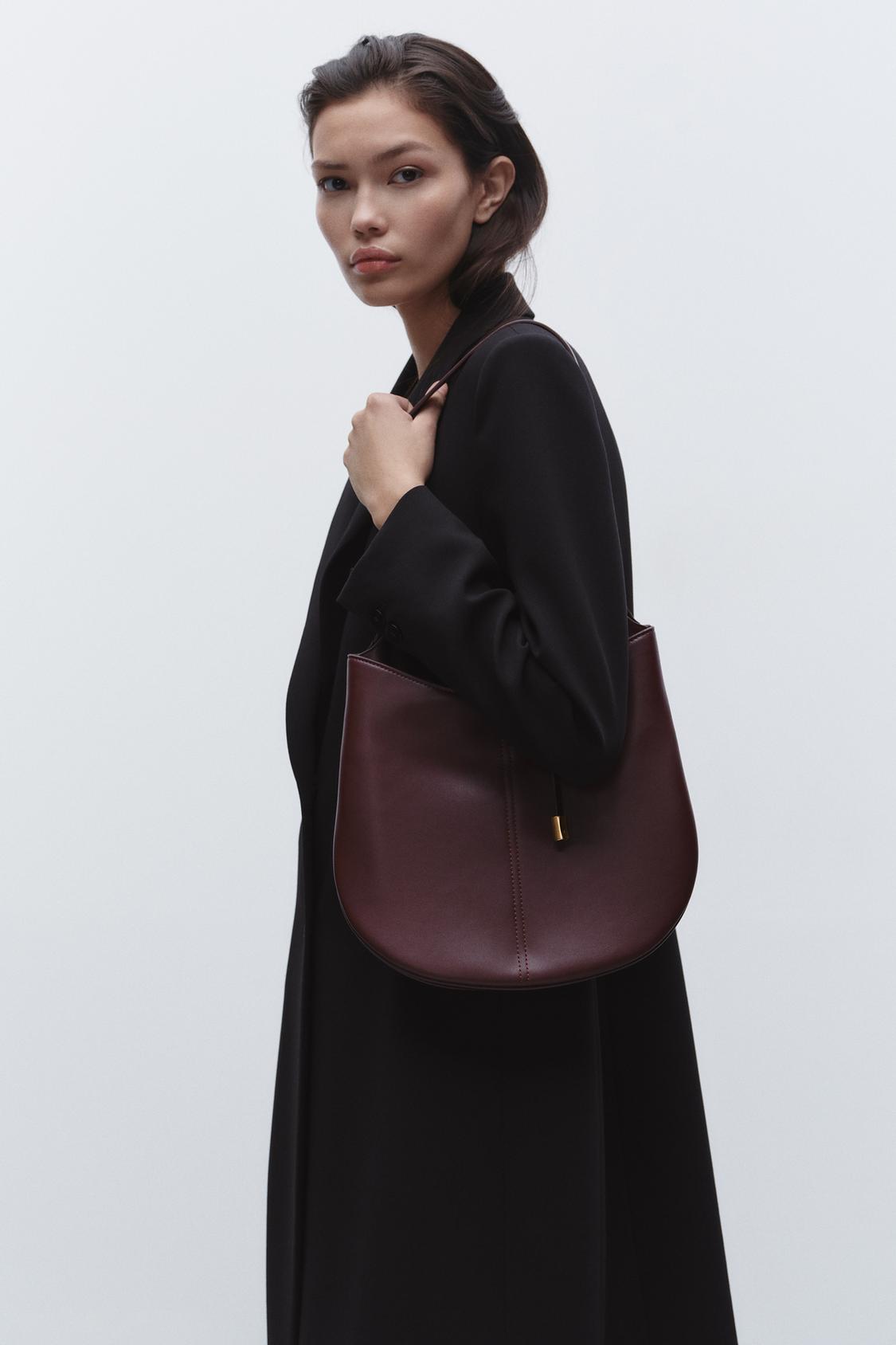 BUCKET BAG WITH HANGER DETAIL