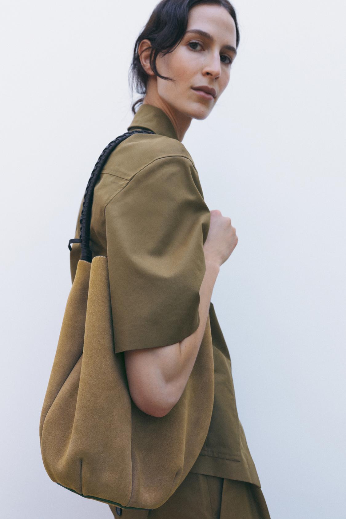 BRAIDED SPLIT SUEDE FLOWER BUCKET BAG