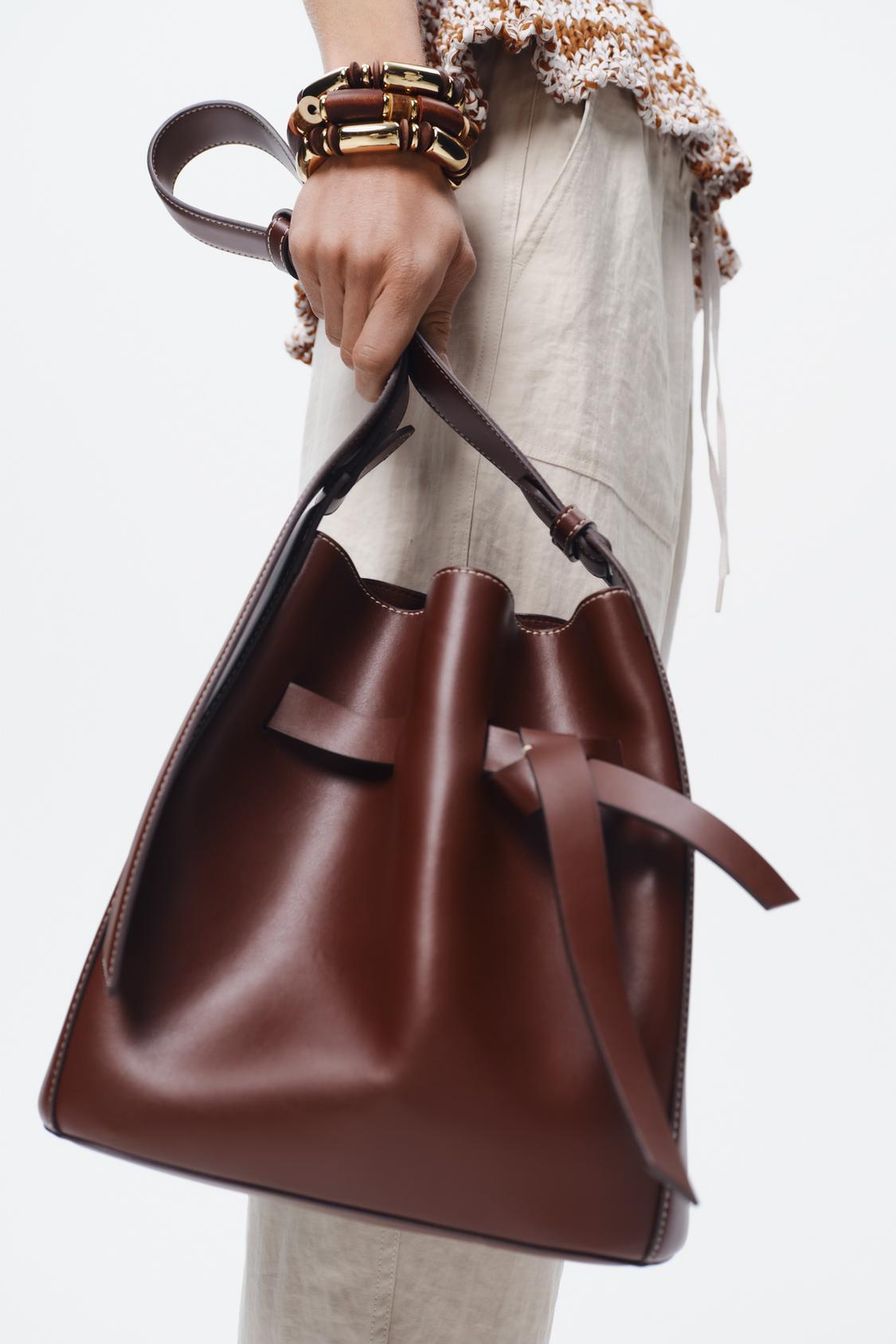 KNOTTED STITCHED BUCKET BAG