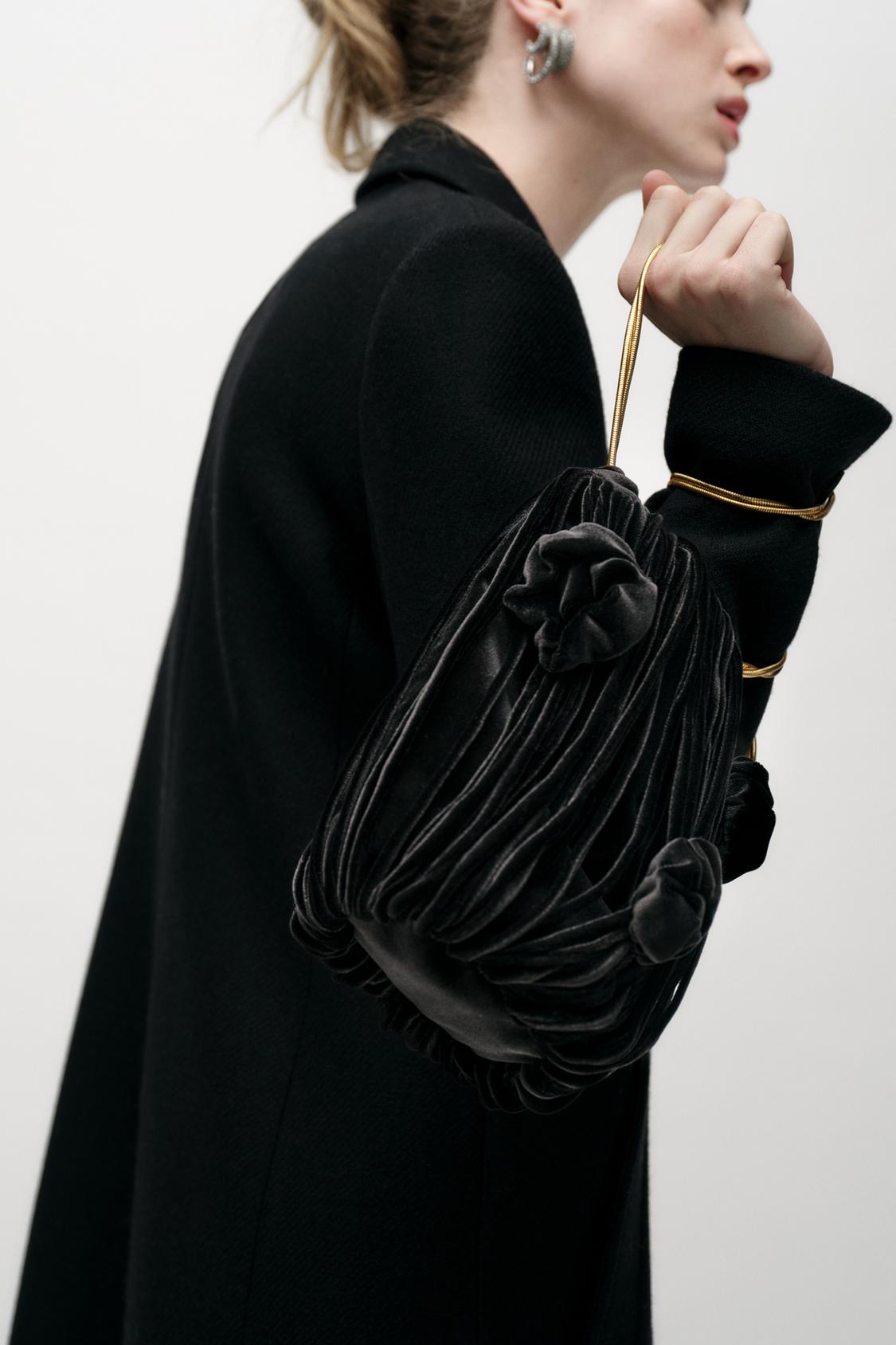 VELVET-EFFECT BUCKET BAG WITH FLORAL DETAIL