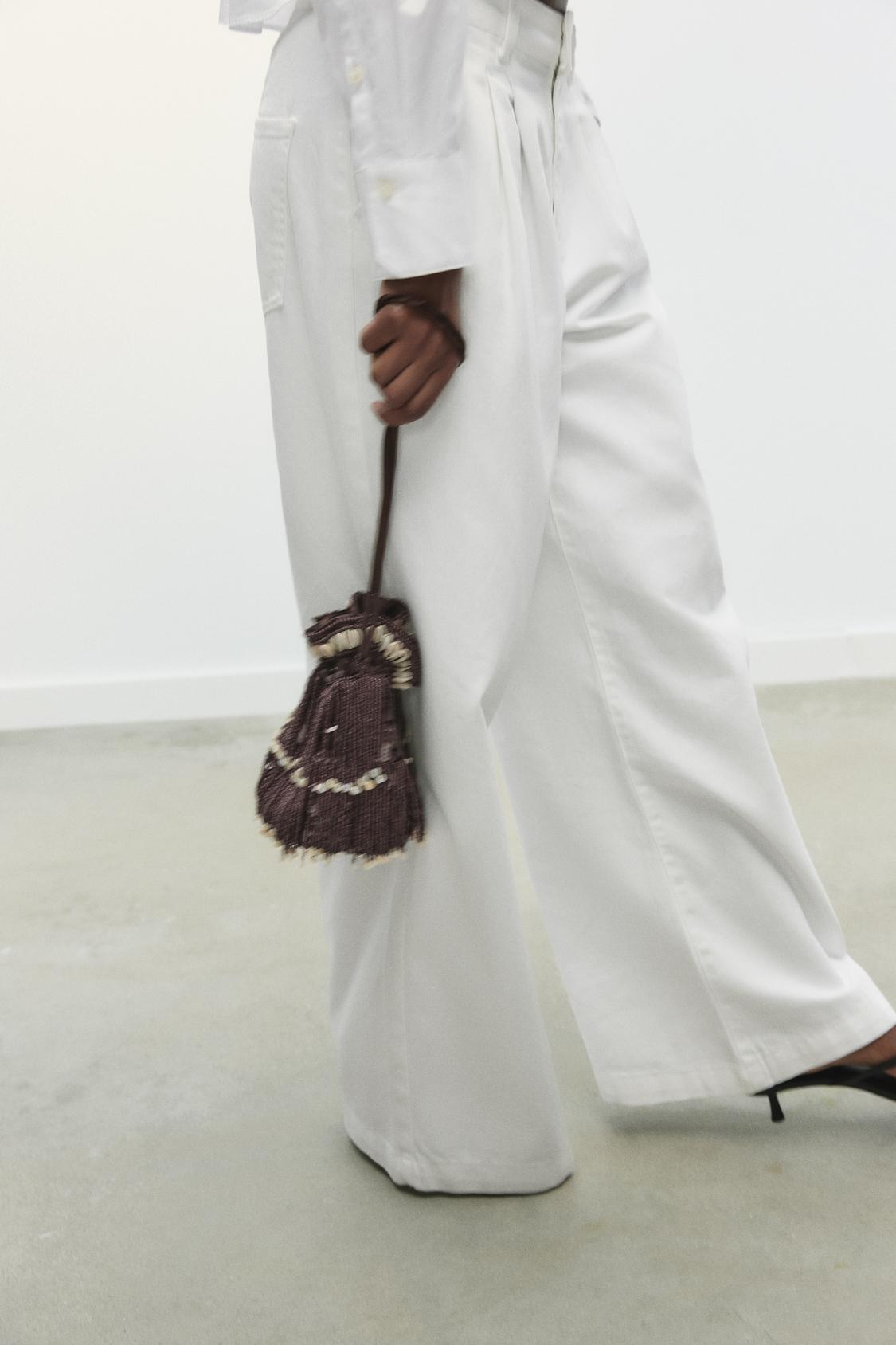 GLITTERY MINI BUCKET BAG WITH SHELLS