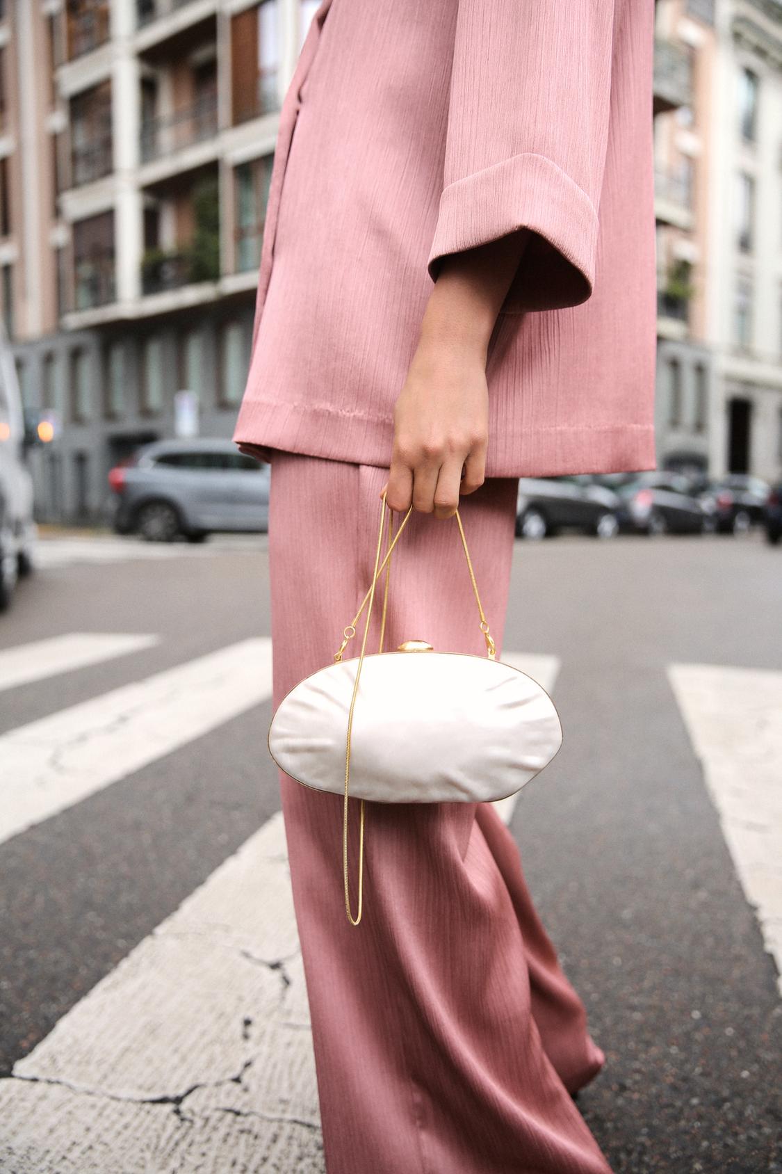 PEARL-EFFECT CLUTCH BAG