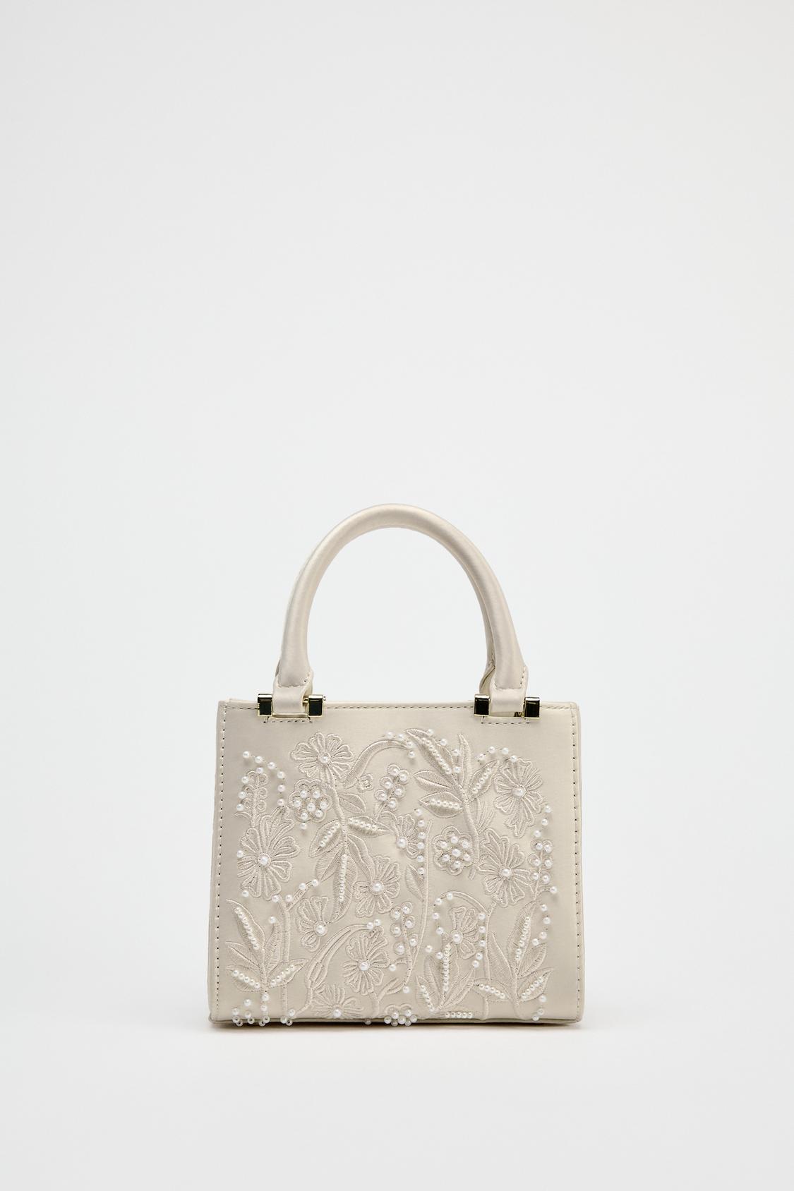 SATIN-EFFECT PEARL HANDBAG